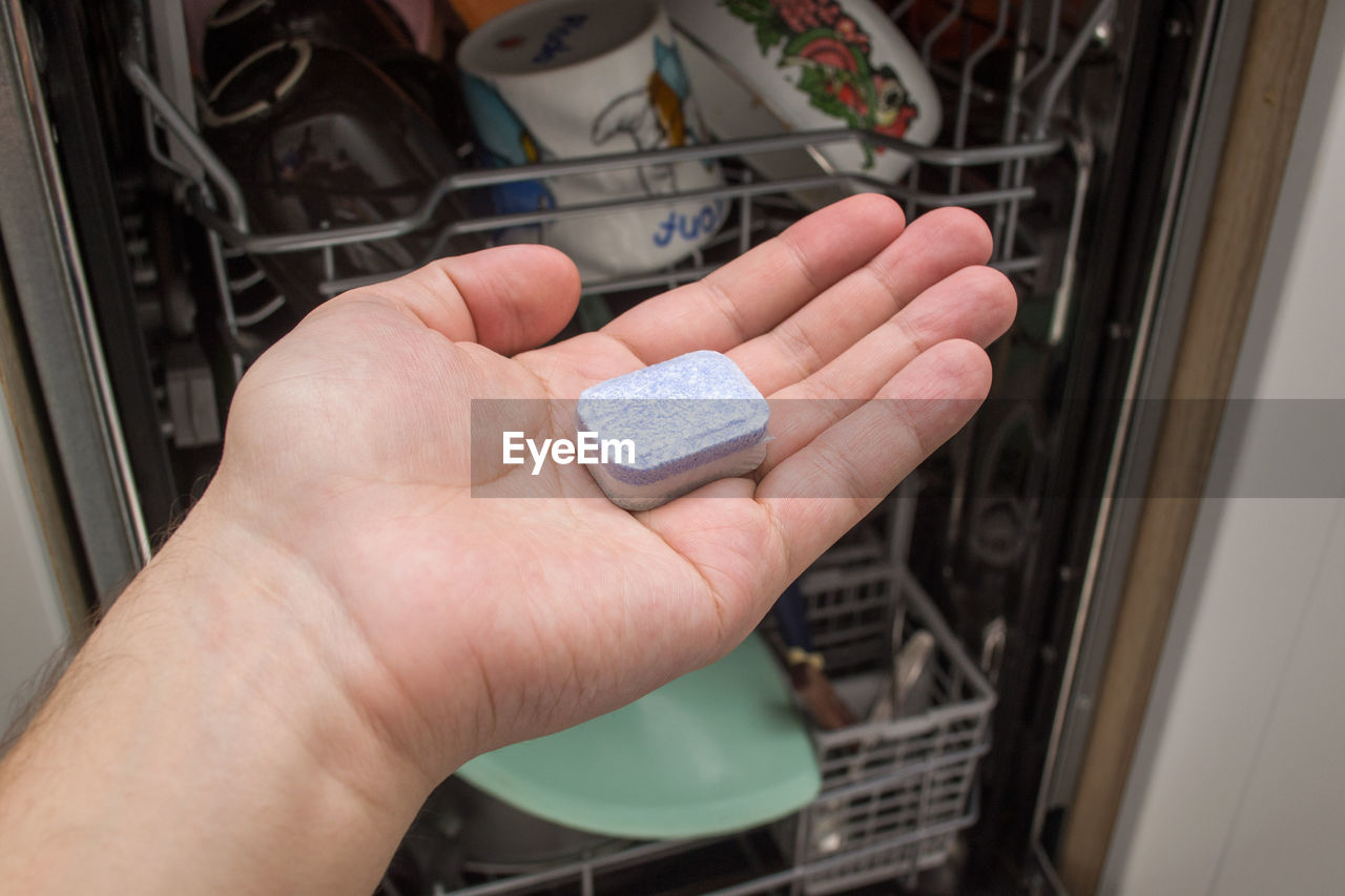 High angle view of person holding hands