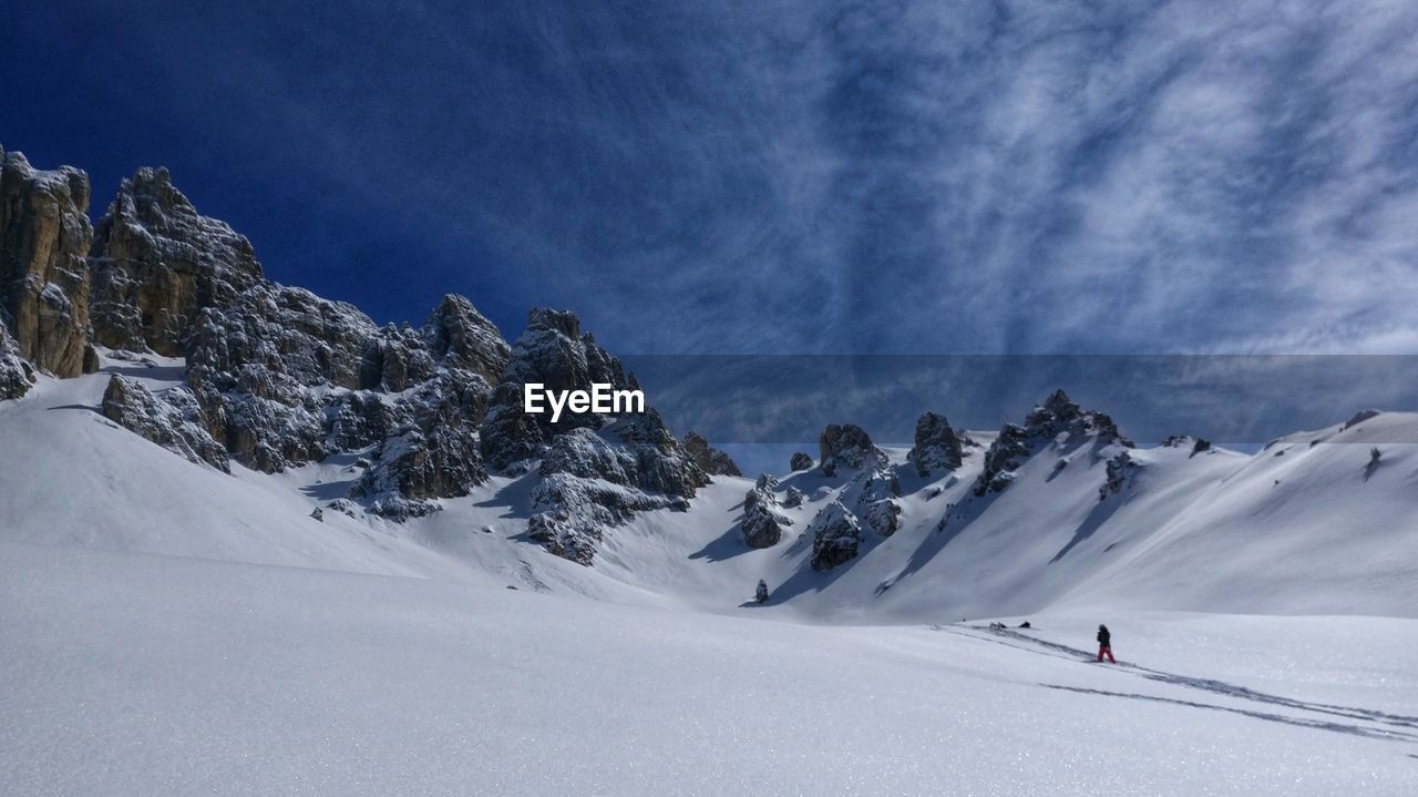 Scenic view of snowcapped mountain against sky