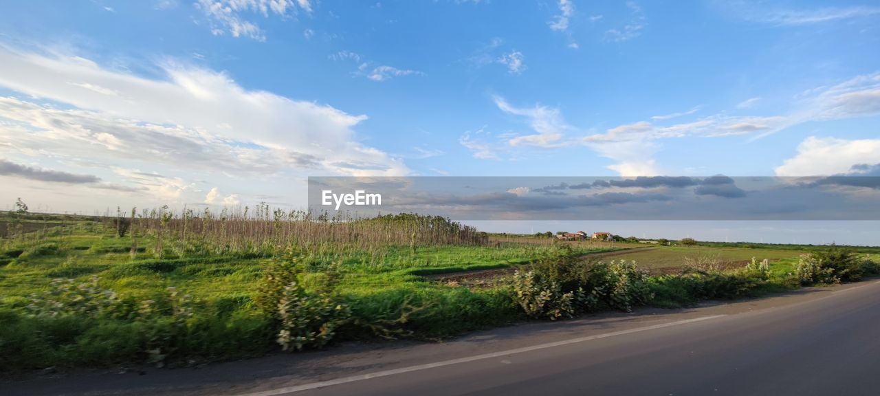 SCENIC VIEW OF ROAD AGAINST SKY