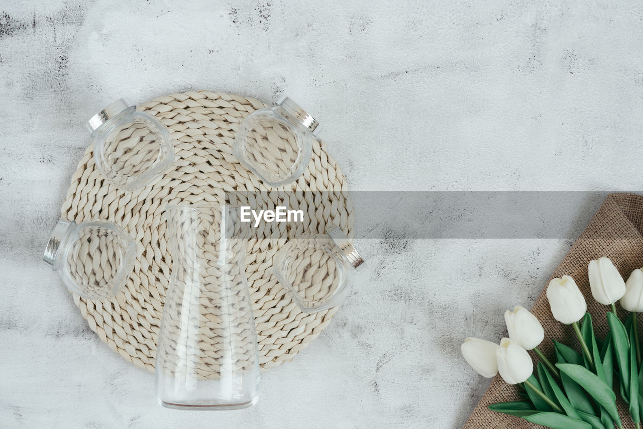 HIGH ANGLE VIEW OF WHITE WALL IN BASKET