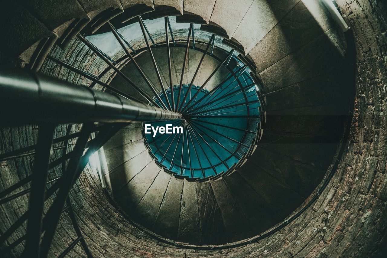 Directly below shot of spiral staircase