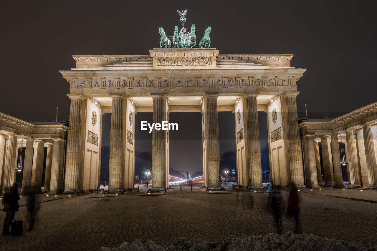 Low angle view of illuminated brandenburg gate at night