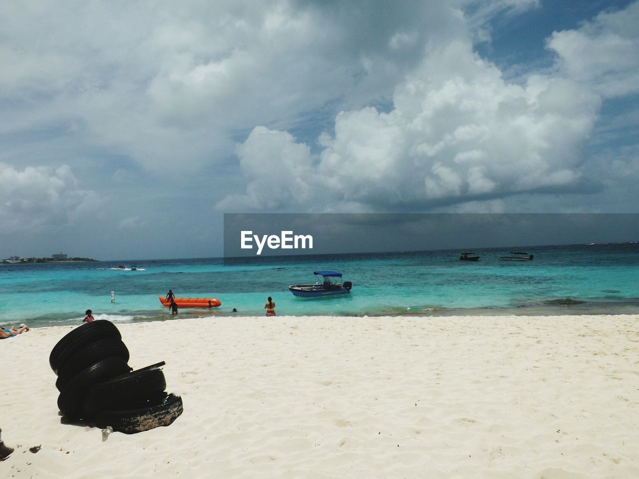 Scenic view of sea against cloudy sky