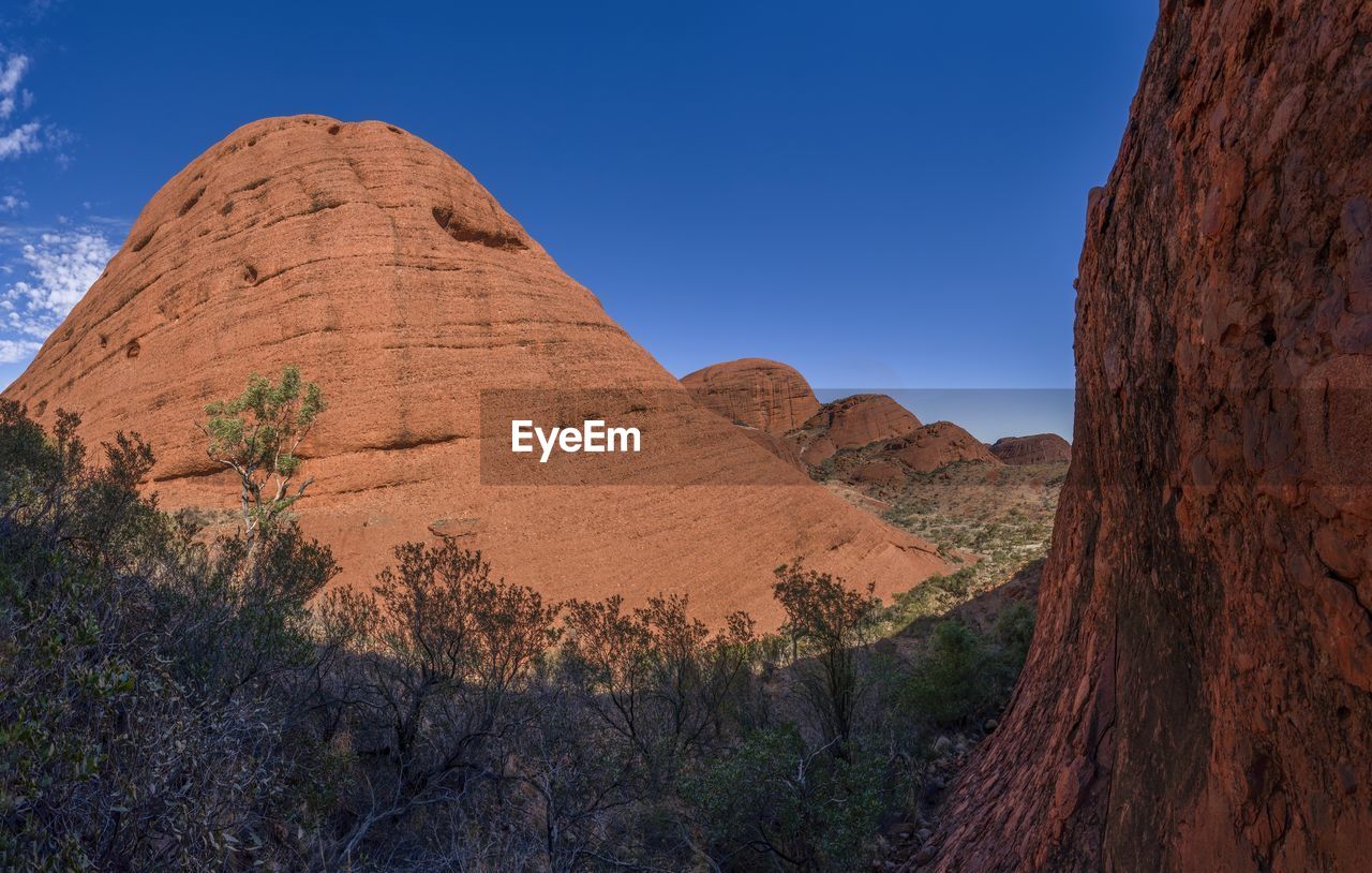 SCENIC VIEW OF MOUNTAINS AGAINST CLEAR SKY