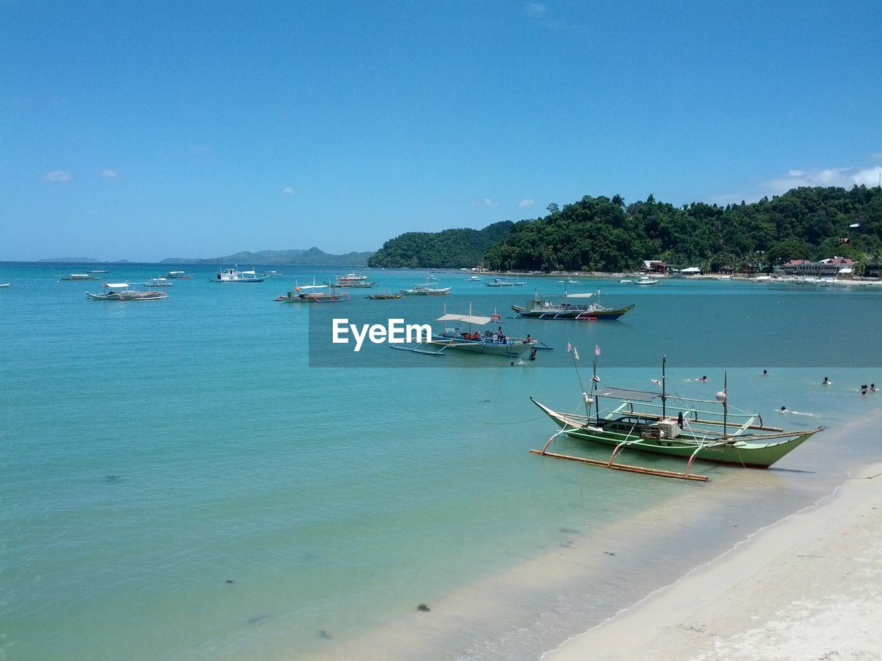 Boats in turquoise sea