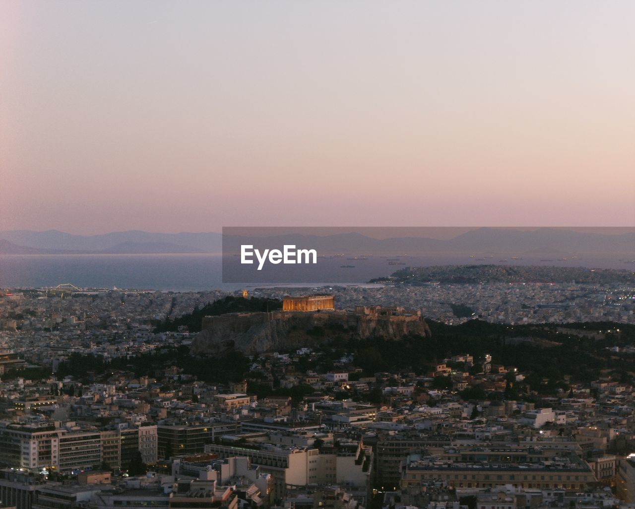 High angle view of acropolis against sky during sunset