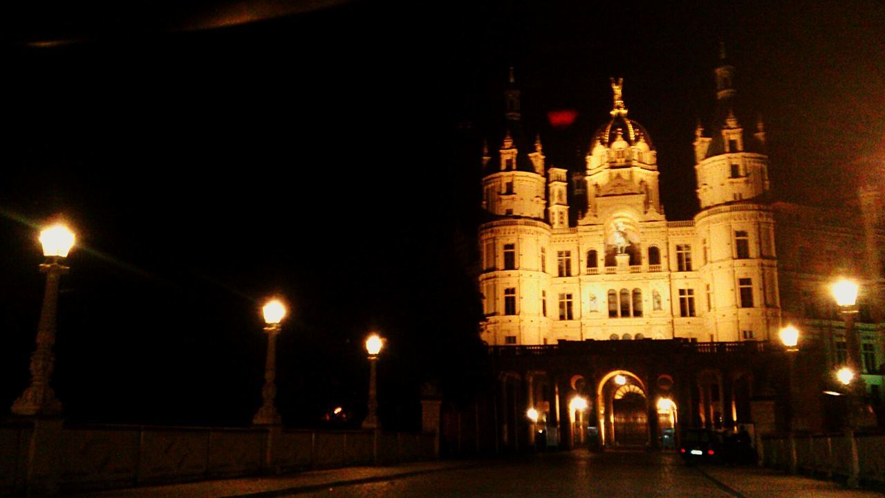 Illuminated schwerin palace at night