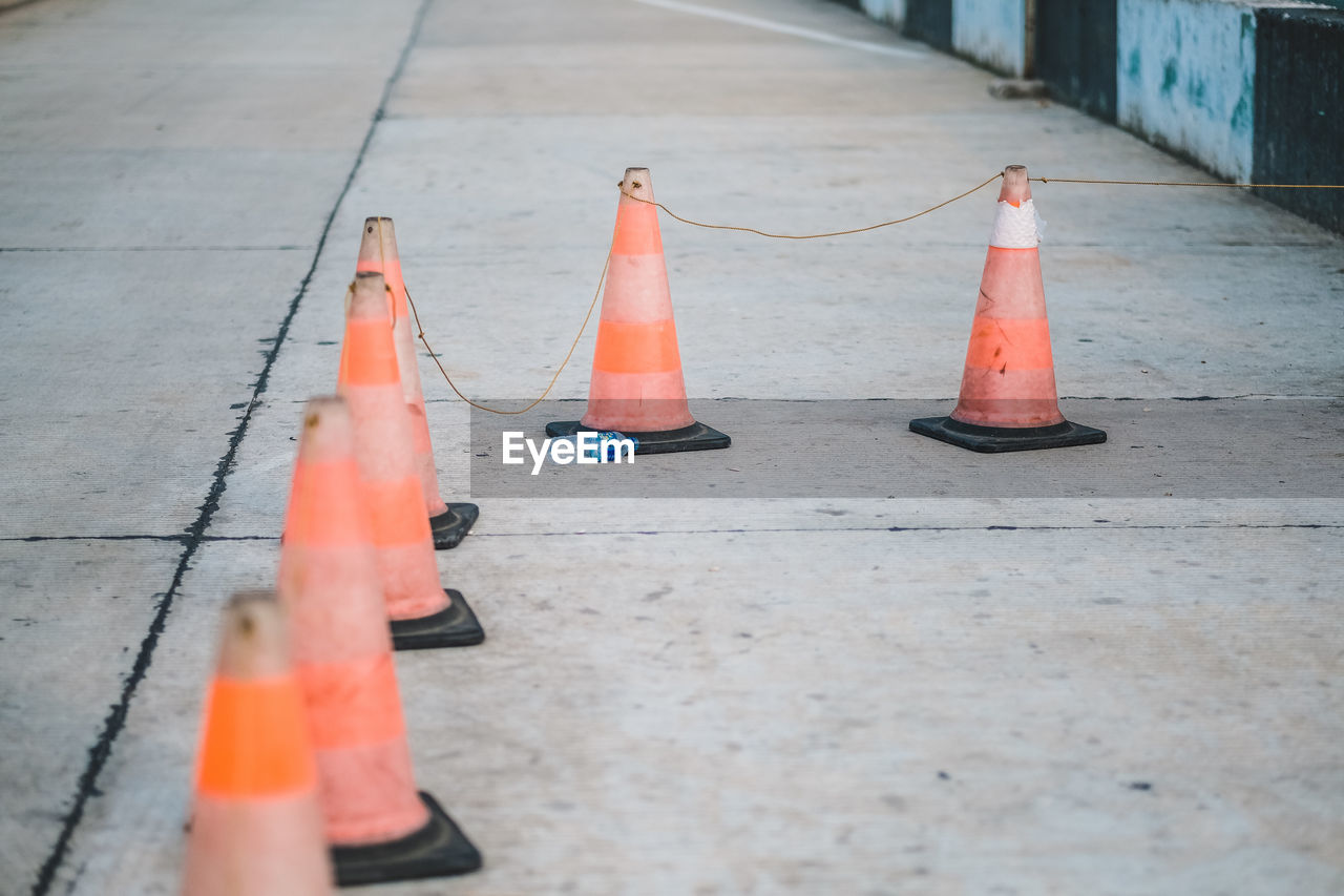 Traffic cones in row on street