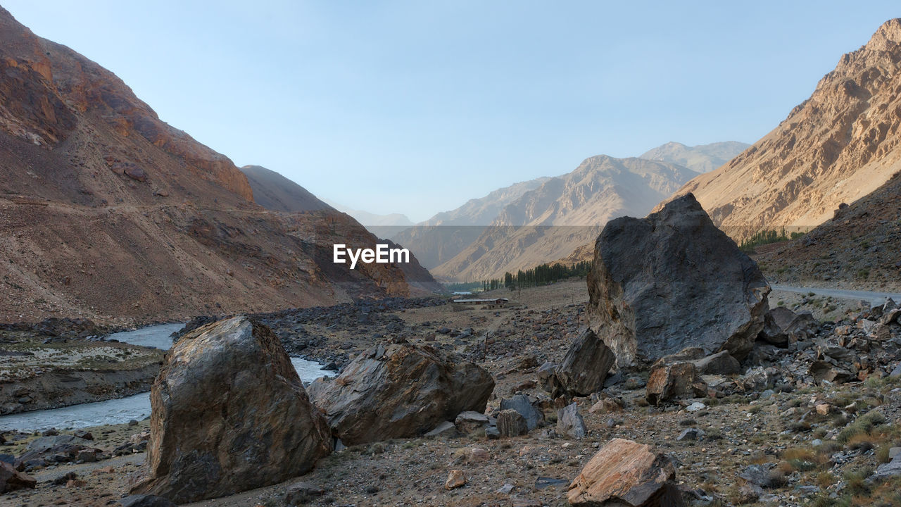 Scenic view of rocky mountains against clear sky