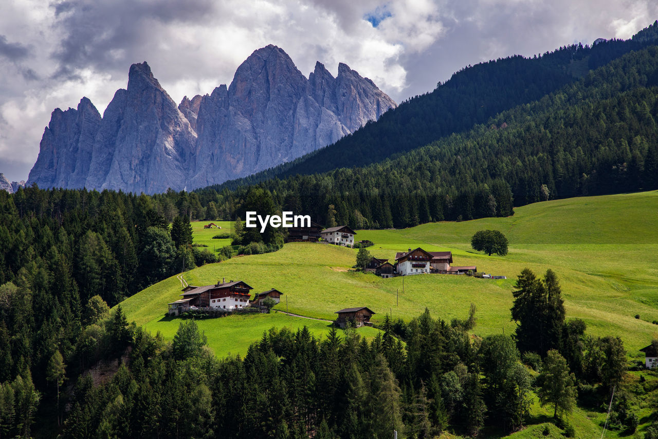 Scenic view of landscape and mountains against sky