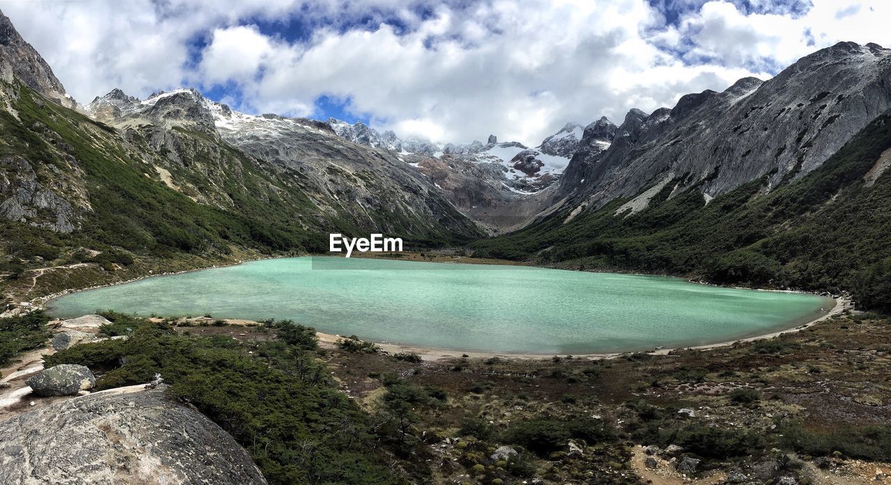 Scenic view of landscape and mountains against sky