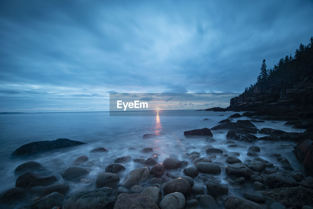 Boulder beach sunrise on rugged maine acadia nat'l park