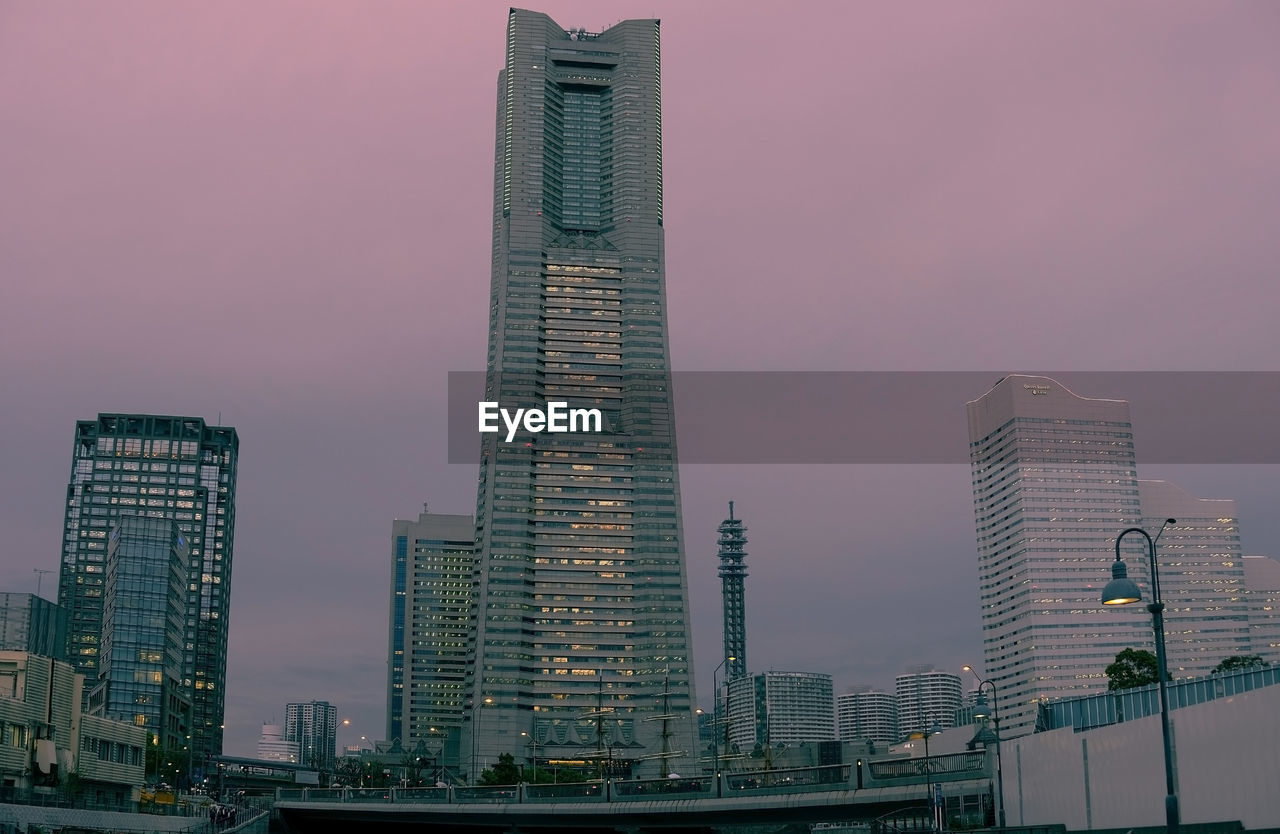 Low angle view of skyscrapers against sky