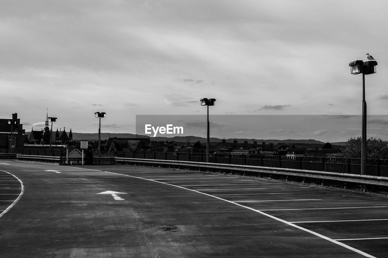 Empty parking lot against sky