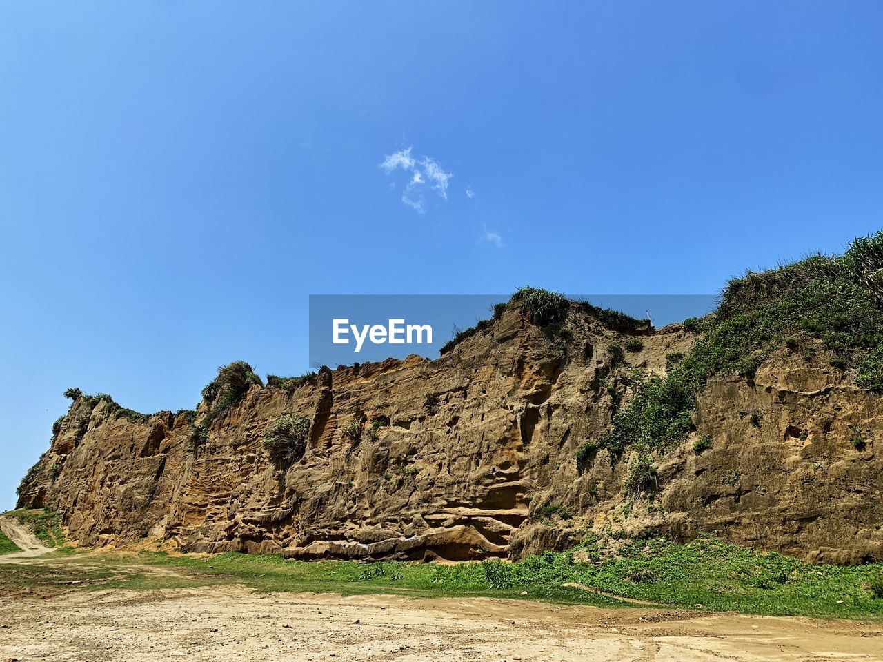 ROCK FORMATIONS ON LAND AGAINST SKY