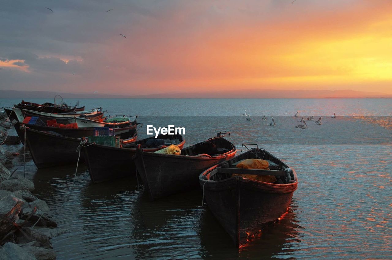 SCENIC VIEW OF SEA AT SUNSET