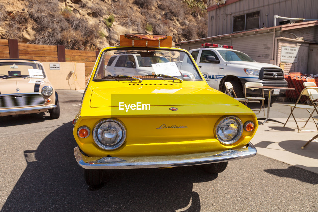 YELLOW CAR ON CITY