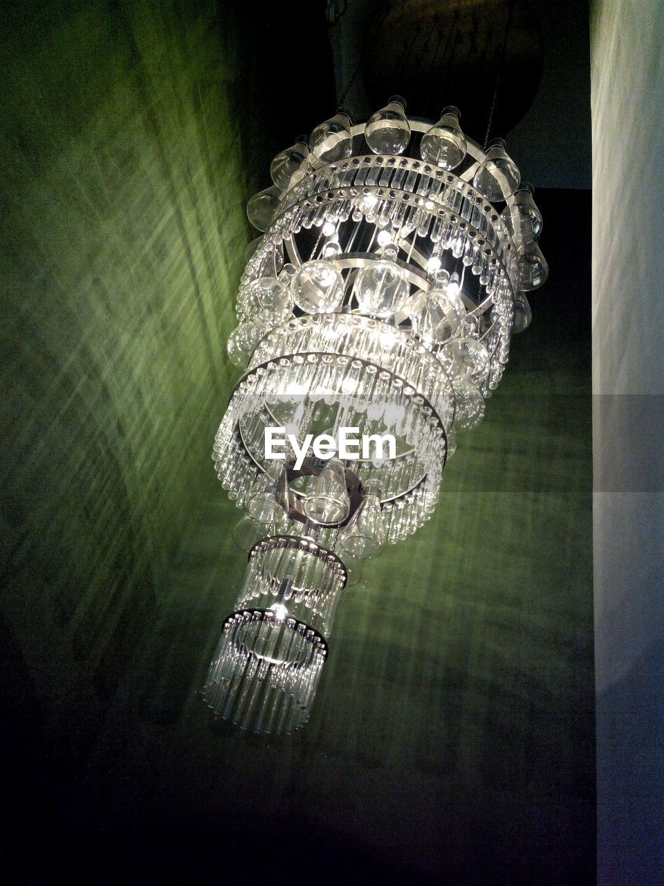 Low angle view of illuminated chandelier