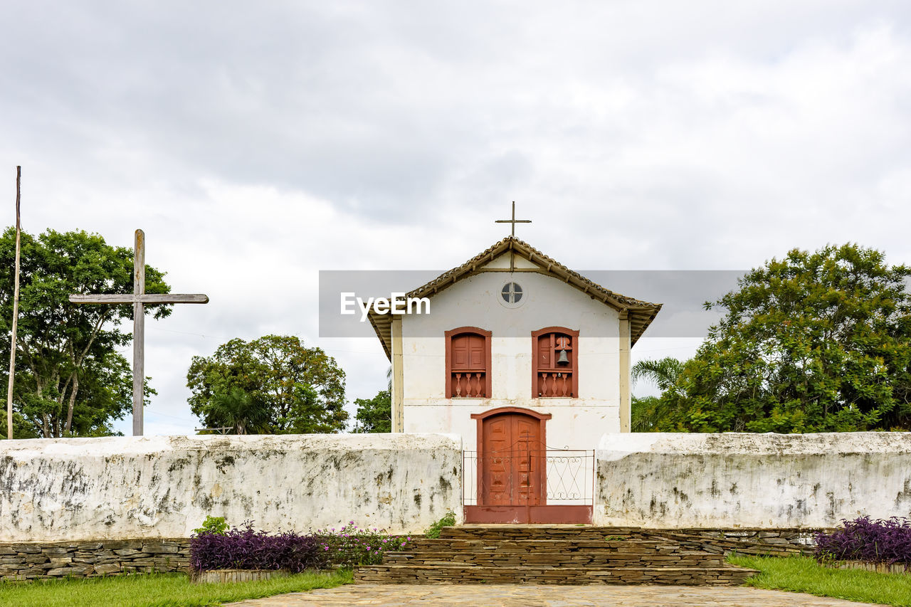 Exterior of old historic church against sky