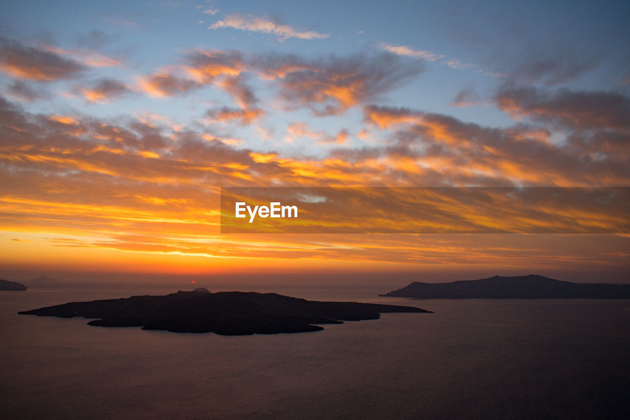 Scenic view of sea against sky during sunset. fira, santorini 