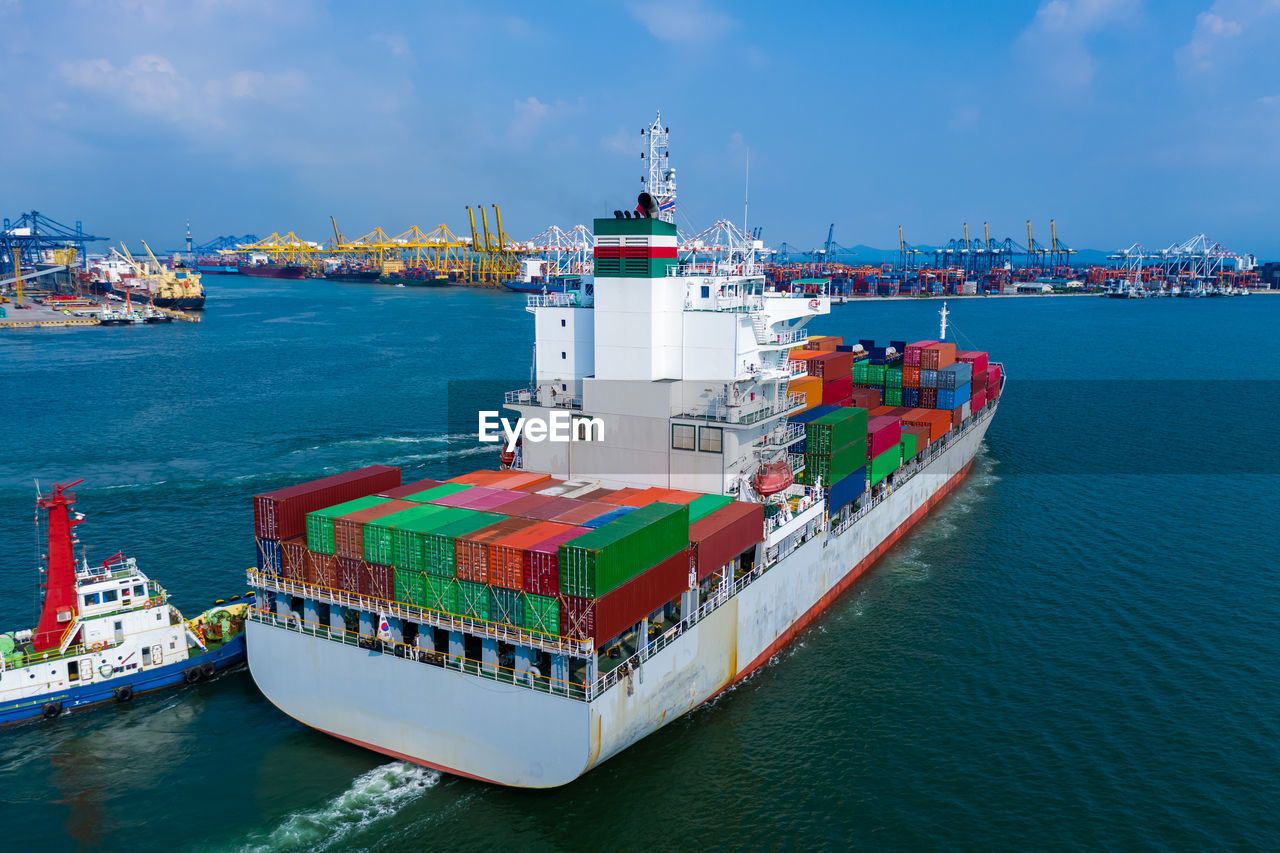 Shipping containers import export international business services by the sea 