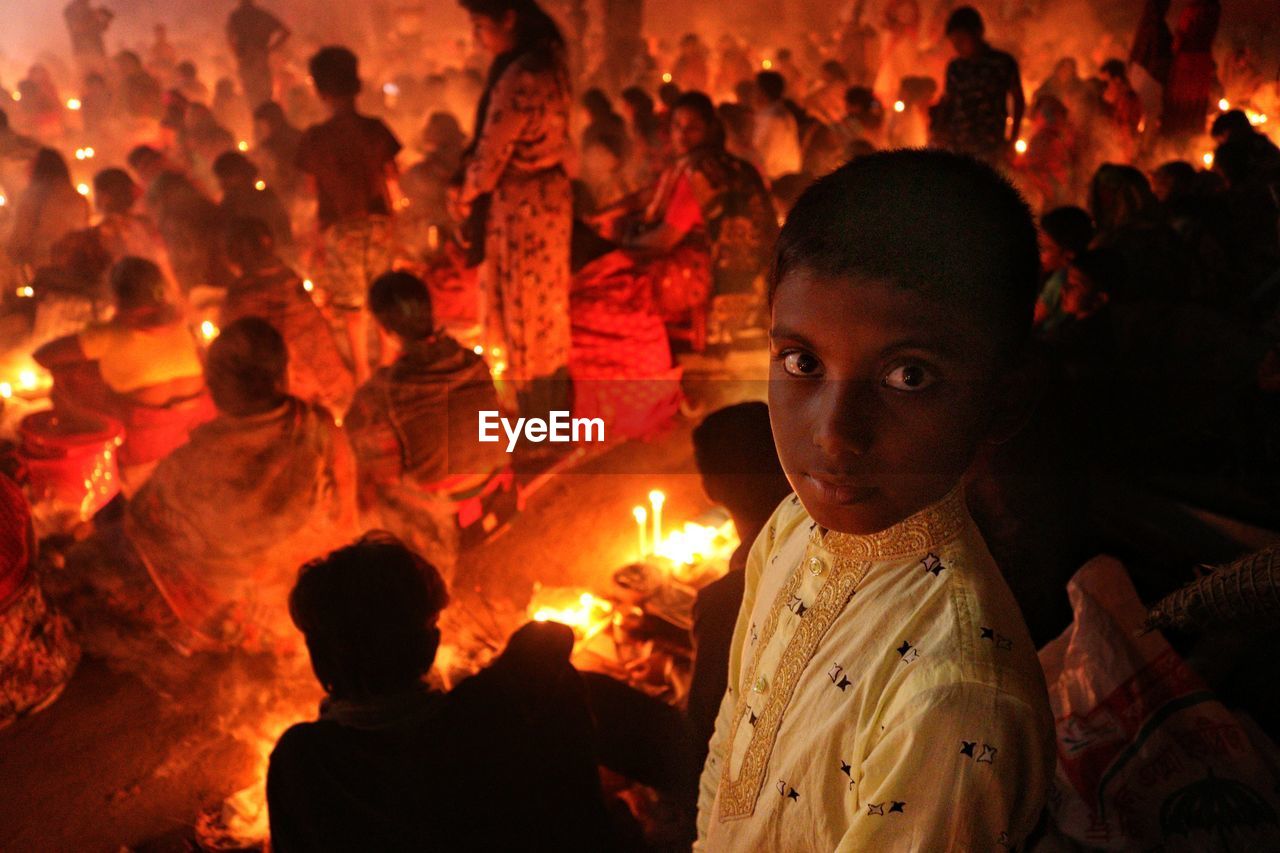 A boy is looking at camera at rakher upobash barodi lokhnath brahmachari ashram