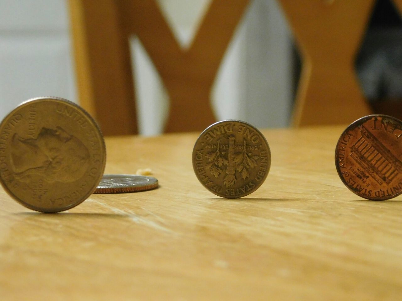 CLOSE-UP OF COINS