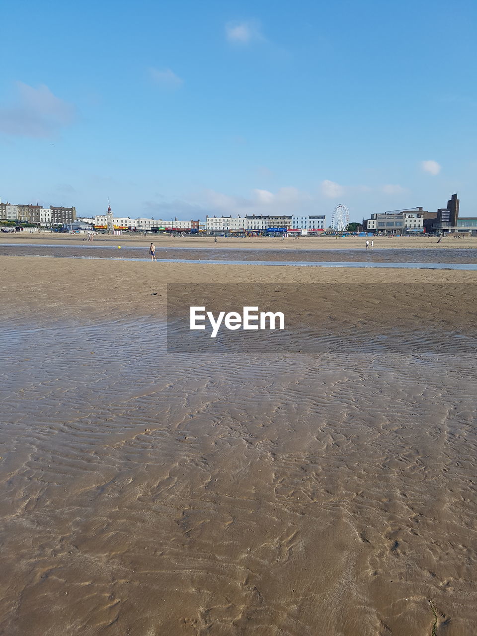 BEACH AGAINST SKY