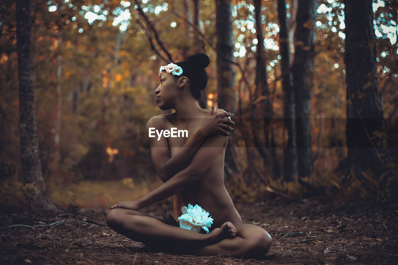 BEAUTIFUL YOUNG WOMAN IN FOREST