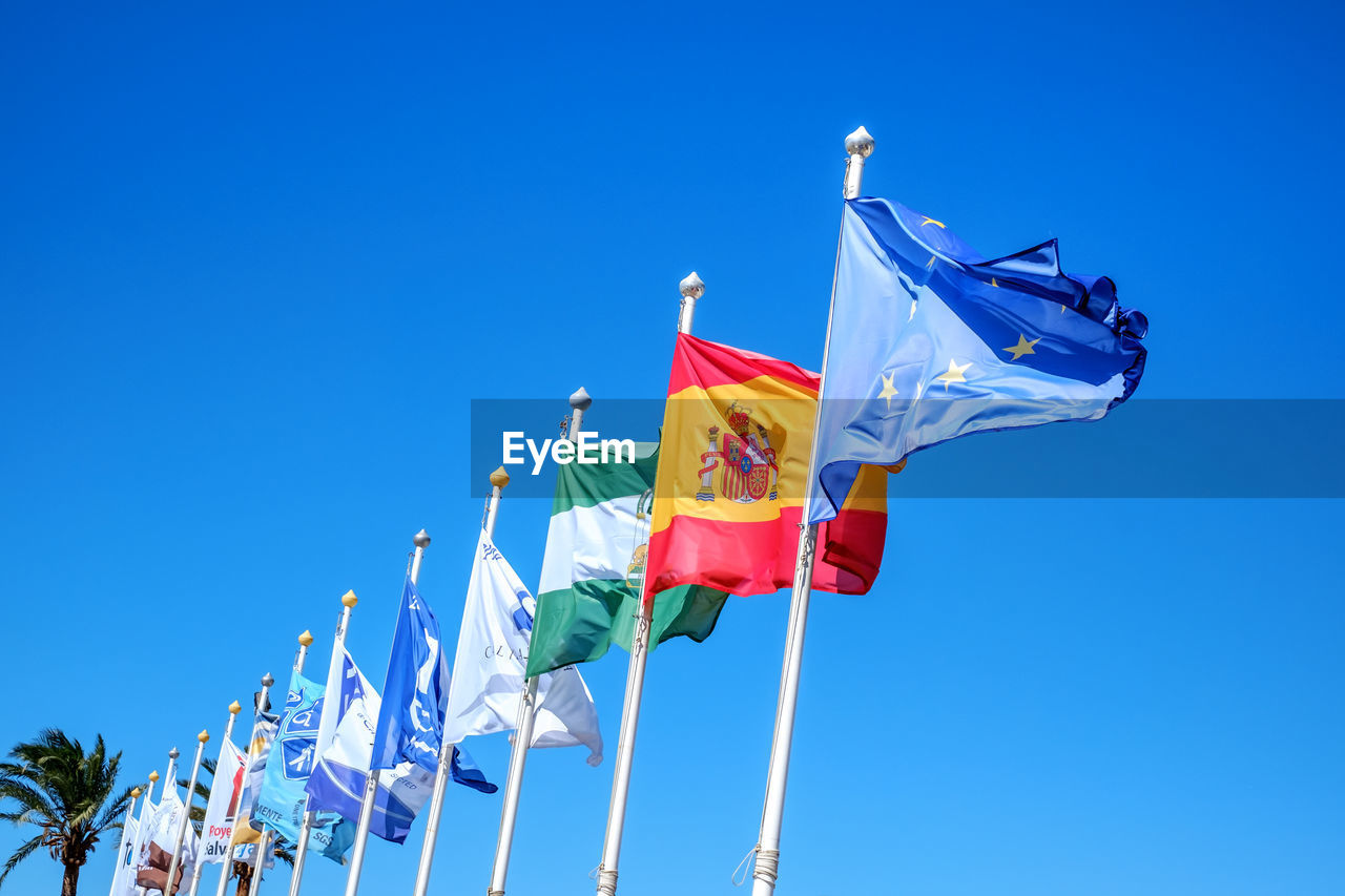  flags of various nations on the mast