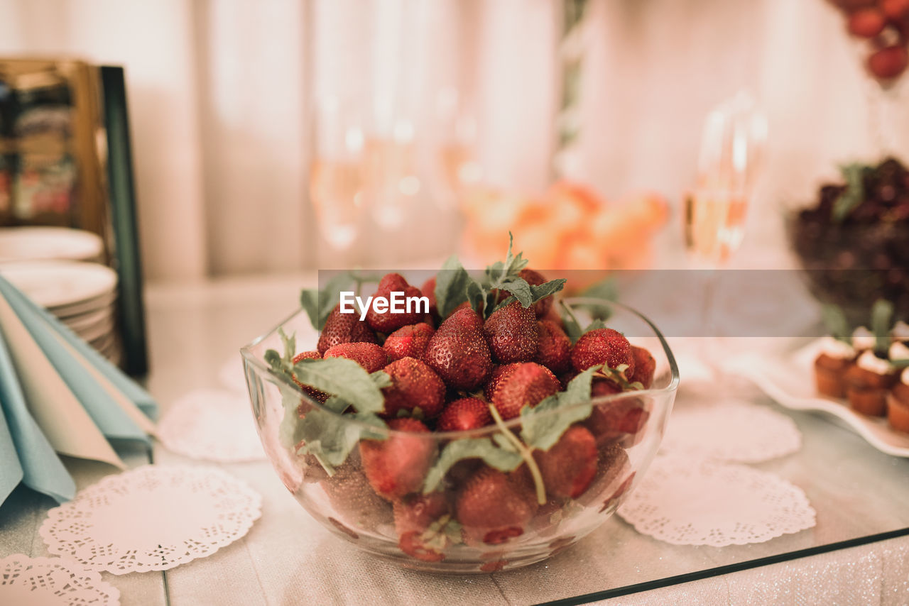 close-up of strawberries in bowl on table