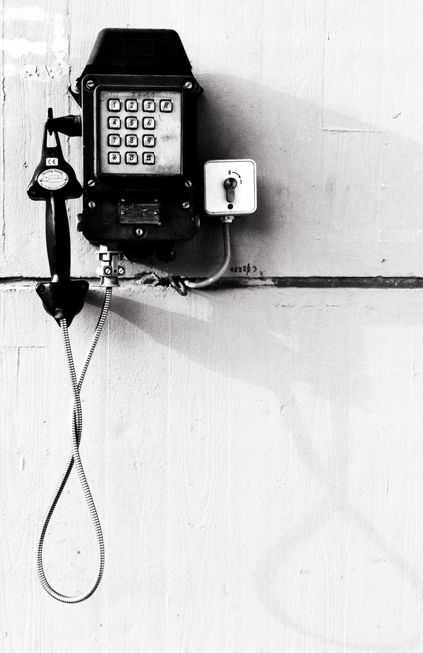 Retro telephone mounted on wall