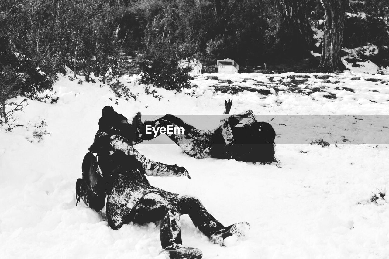 Friends enjoying on snow field