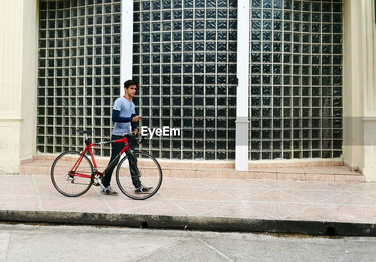 BICYCLES PARKED ON BICYCLE