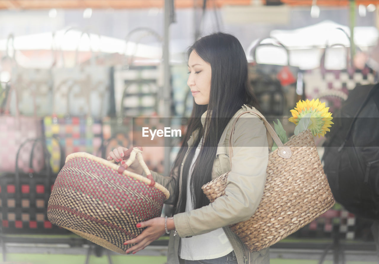 Young asia woman shopping at the market