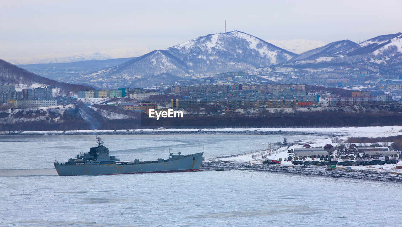 Military transport ship near the shore in winter on the kamchatka peninsula