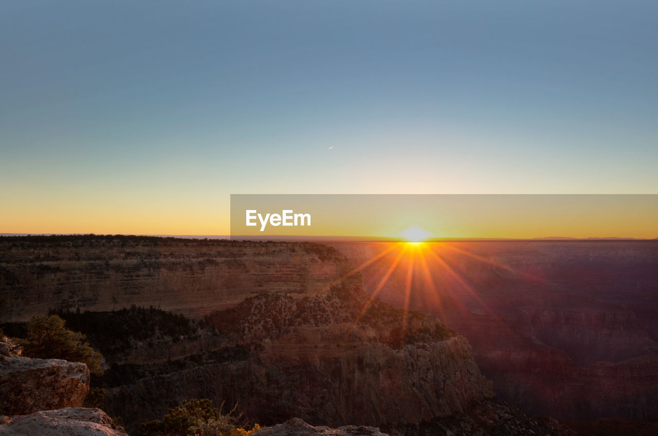 Beautiful view of sunset over dramatic landscape