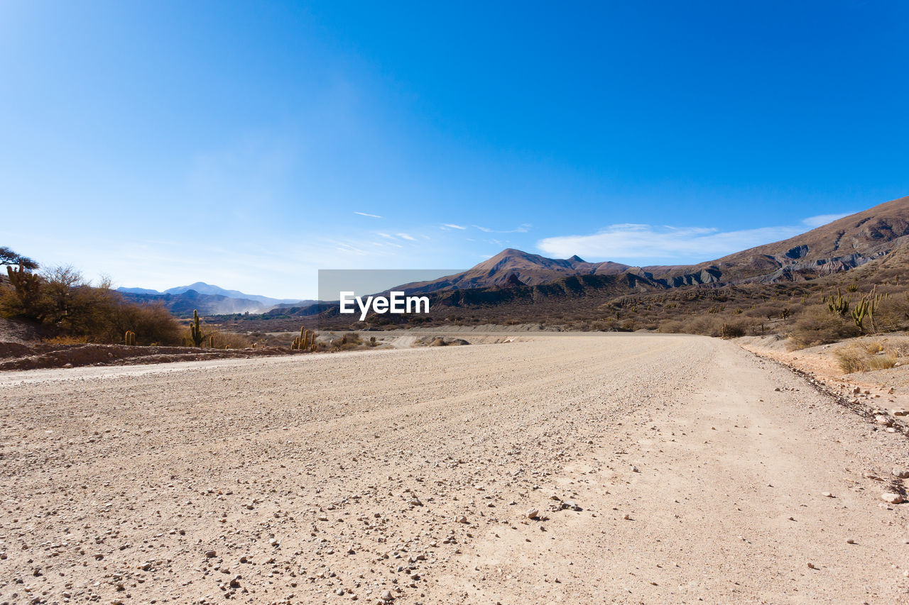 SCENIC VIEW OF DESERT AGAINST SKY