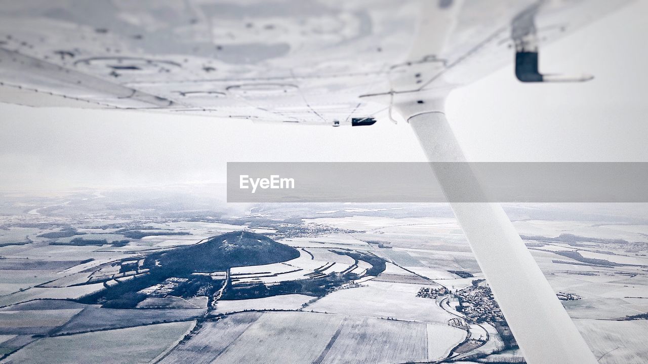 SCENIC VIEW OF SNOW COVERED LANDSCAPE