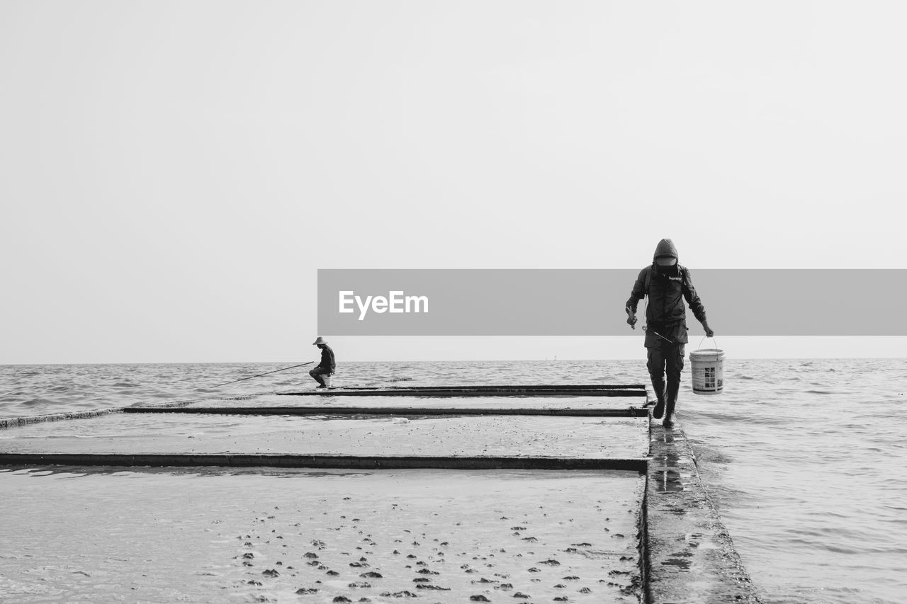 PEOPLE ON BEACH