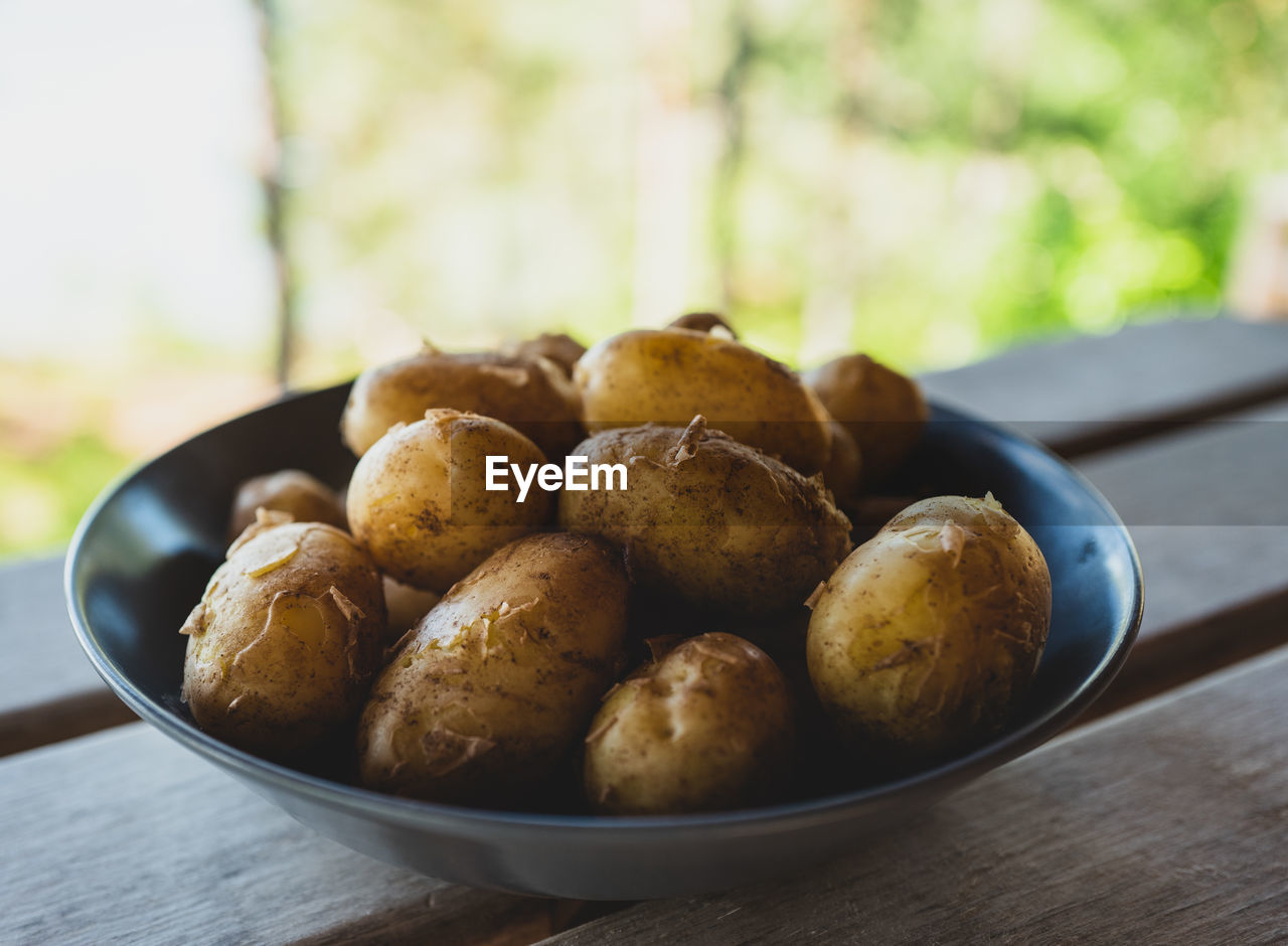 Close-up of new cooked potatoes on table