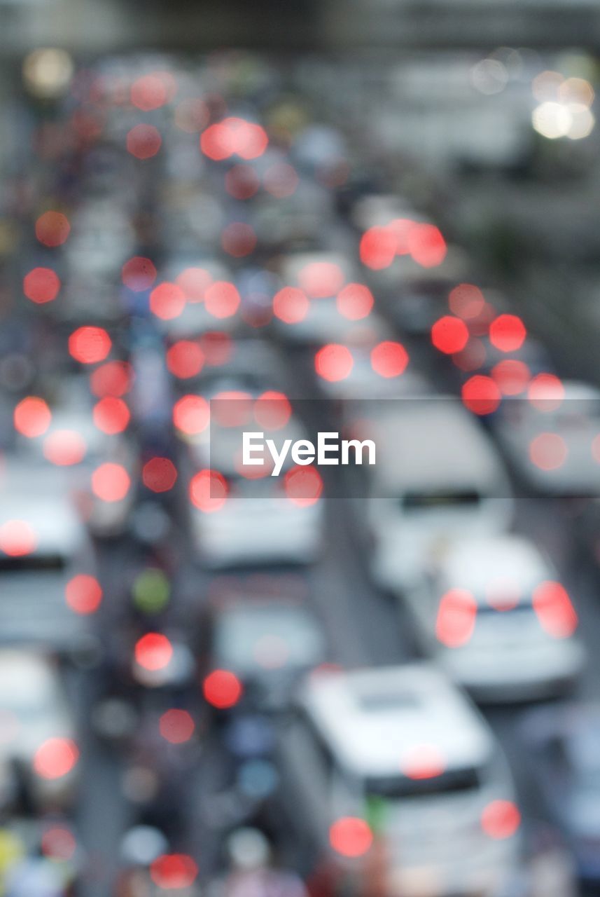 Defocused image of traffic on road at night