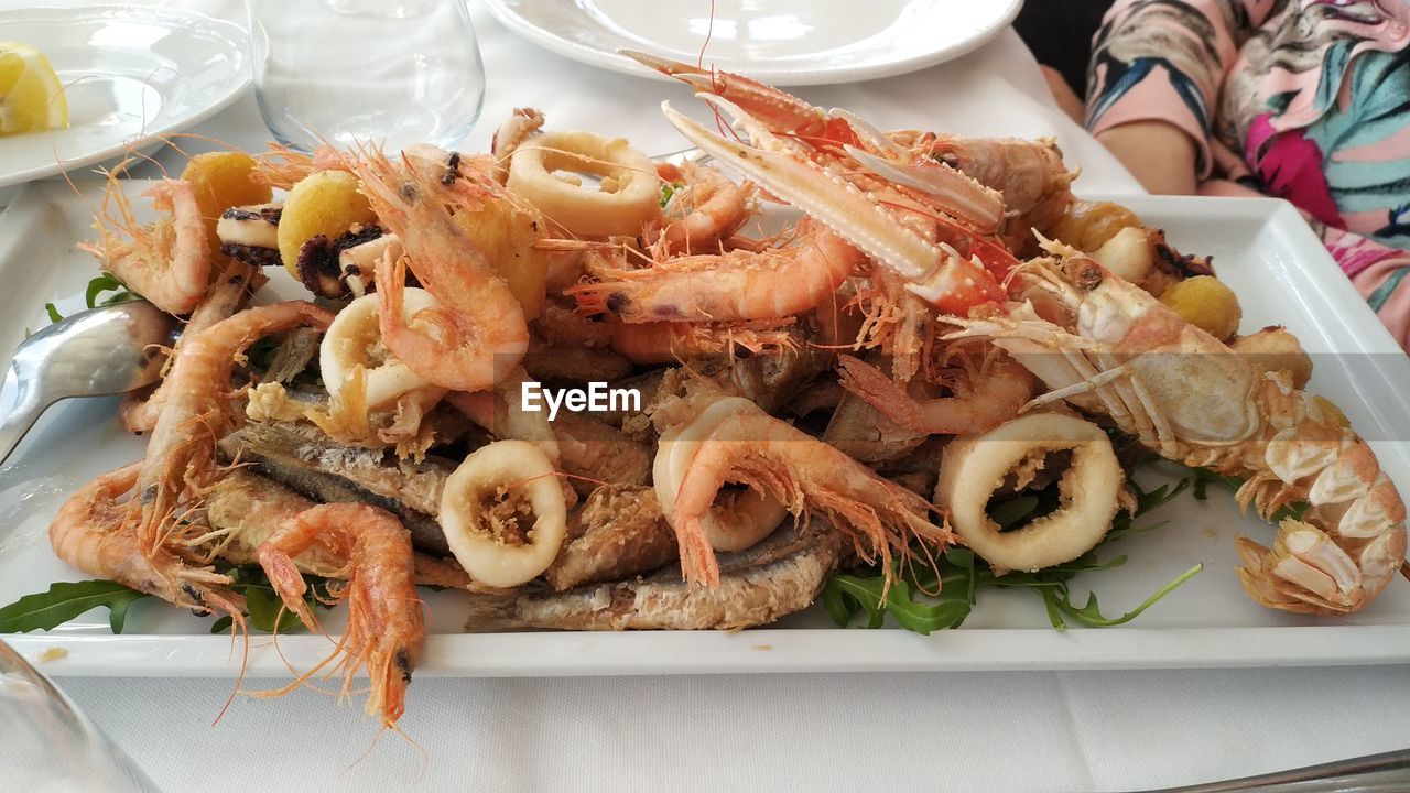 HIGH ANGLE VIEW OF PRAWNS ON TABLE
