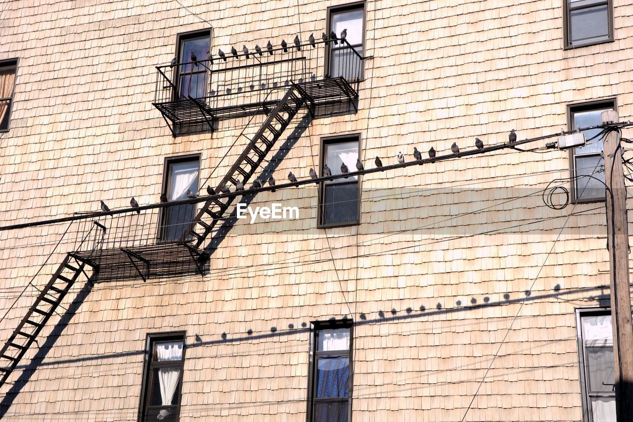 Low angle view of emergency exit on building