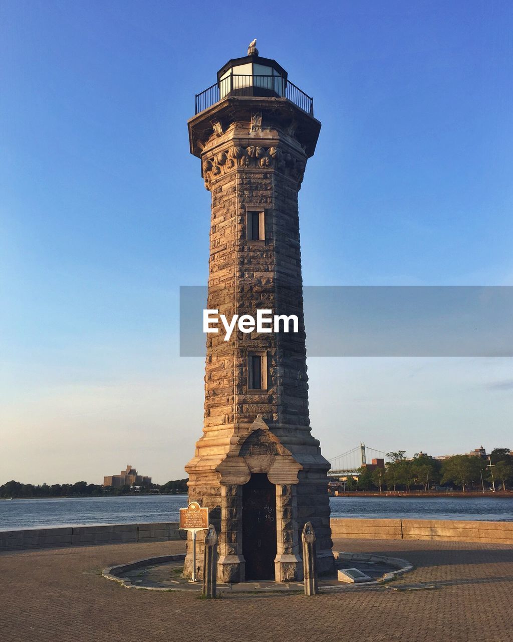 VIEW OF LIGHTHOUSE AGAINST BLUE SKY