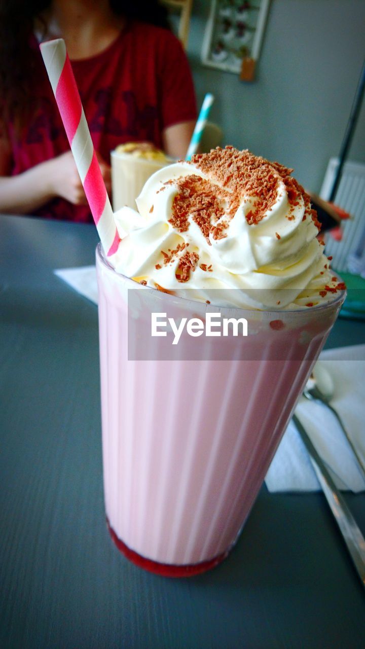 CLOSE-UP OF ICE CREAM IN GLASS