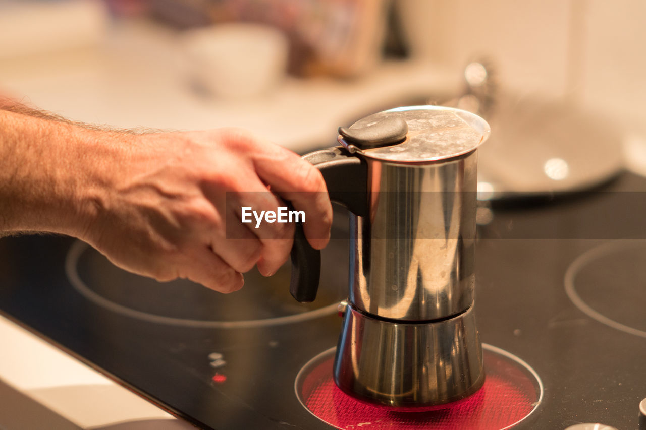 Coffee pot on electric stove. domestic kitchen