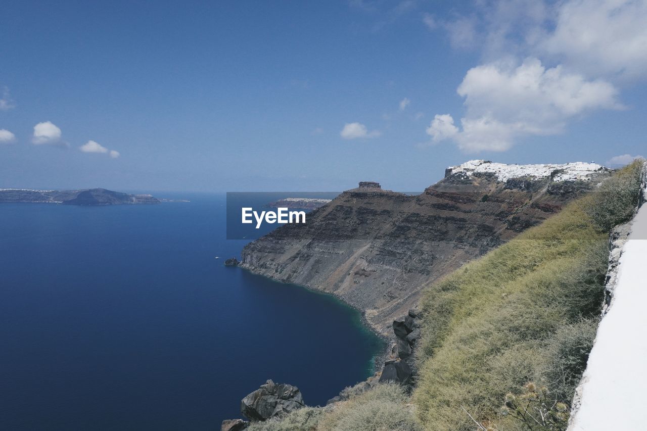 water, sky, sea, cliff, coast, nature, scenics - nature, terrain, land, environment, mountain, beach, cloud, beauty in nature, travel destinations, travel, landscape, blue, bay, no people, coastline, outdoors, ocean, day, tourism, tranquility, reservoir, architecture, tranquil scene, rock, shore, island, body of water, non-urban scene, built structure, lagoon