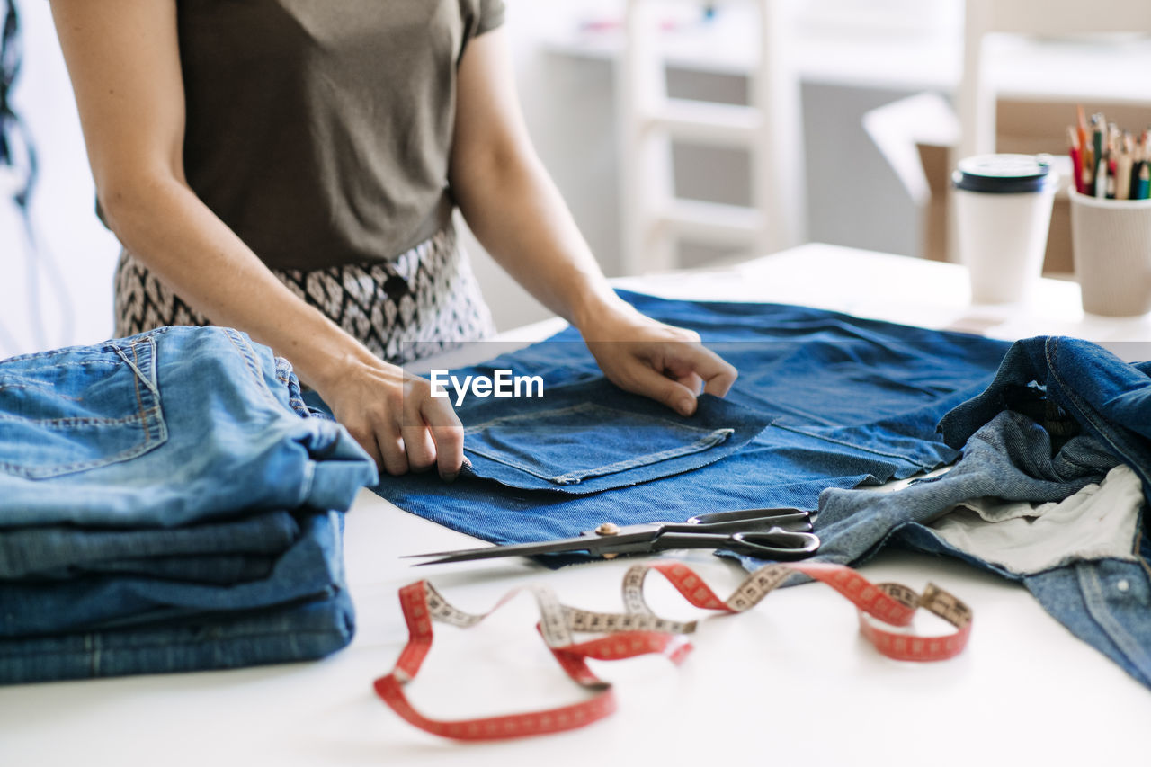 Circular economy. sustainable fashion. reuse, repair, upcycle. denim upcycling ideas, repair and
