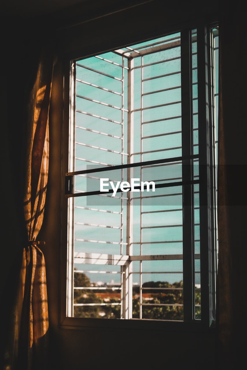 Blue sky seen through window at home